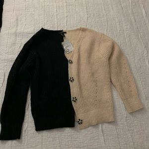 Black and white button up cardigan with rhinestone buttons.